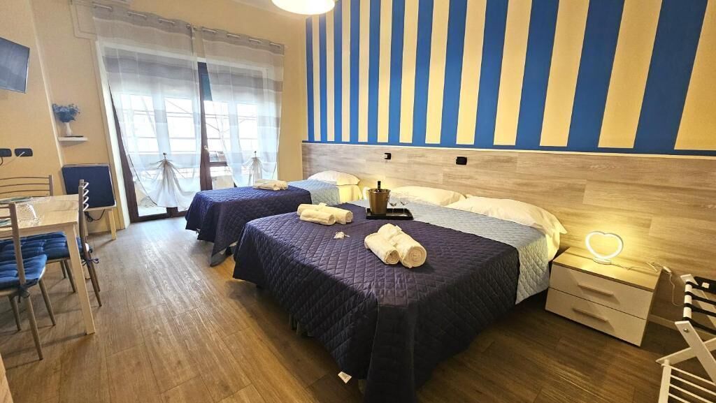 Triple Room | Desk, iron/ironing board