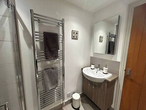 Hair dryer, towels, soap, toilet paper