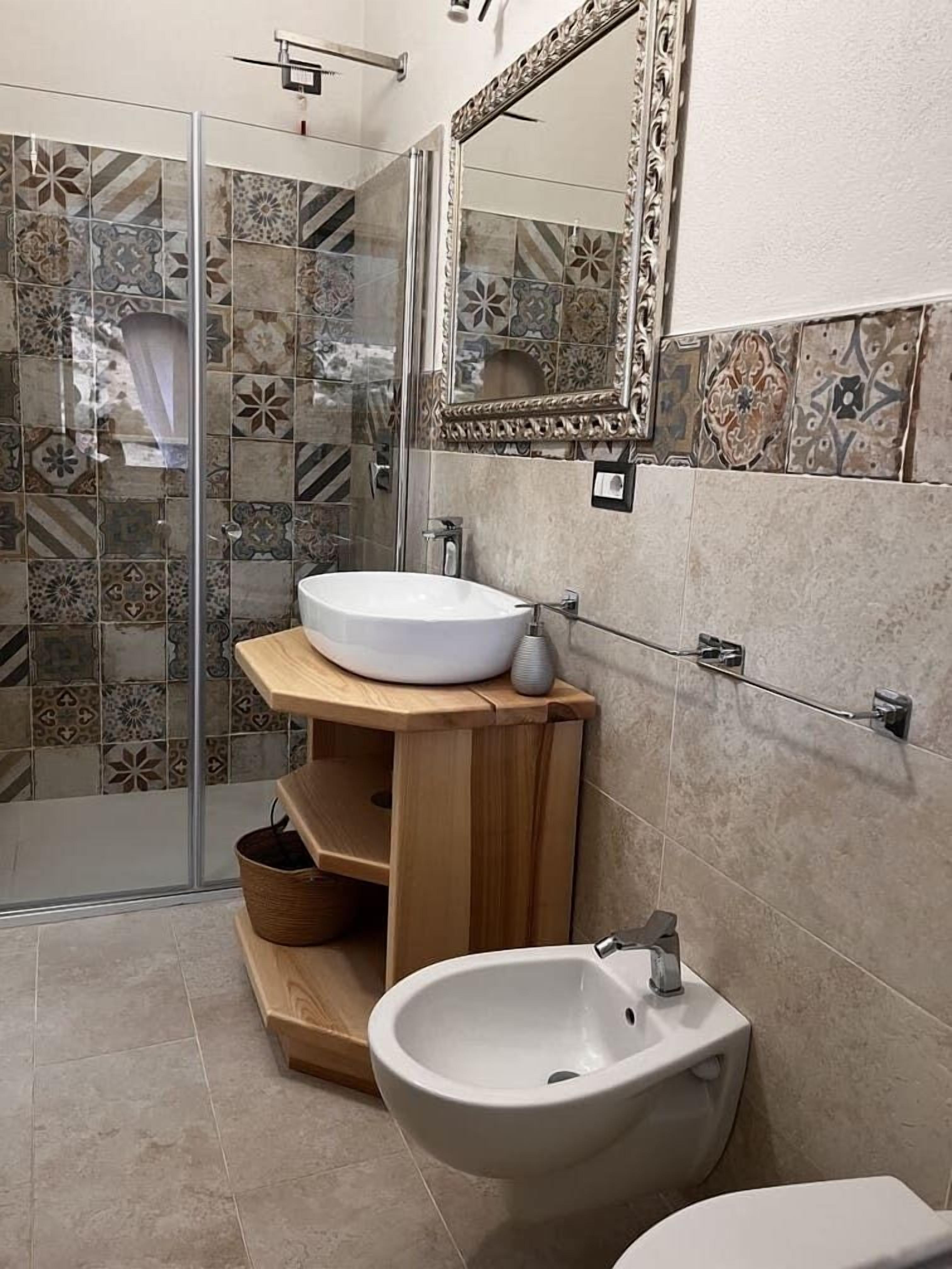 Shower, hair dryer, slippers, towels