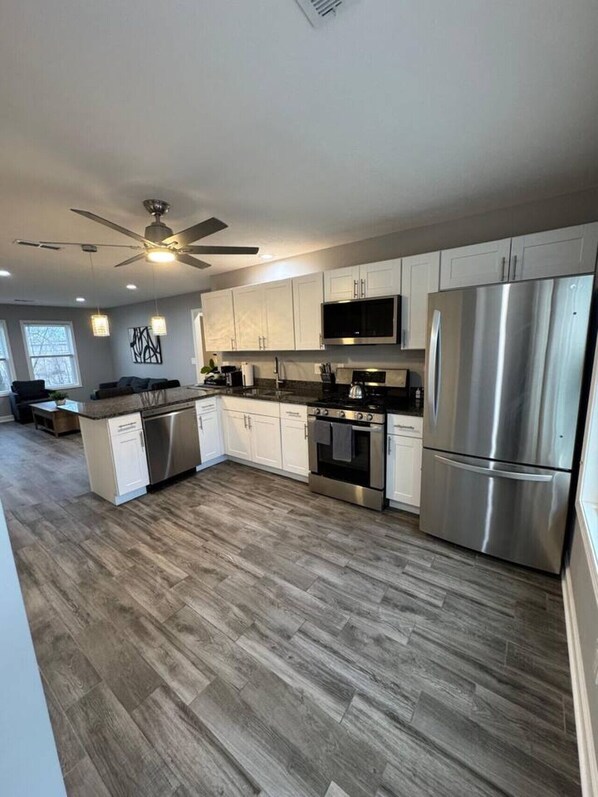 Fridge, microwave, stovetop, coffee/tea maker