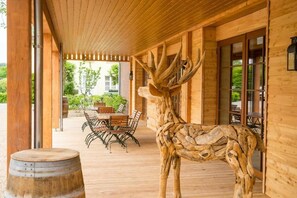 Economy Double Room, Garden View | Outdoor dining | 2 restaurants, dinner served