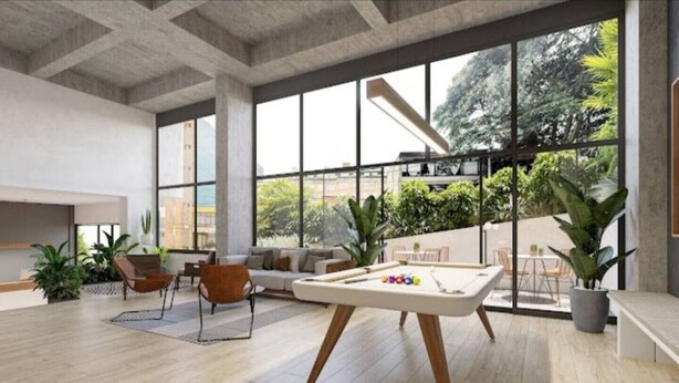 A spacious indoor area with a pool table, comfortable seating, and large windows offering views of greenery. - New, modern and comfortable in the best location (Bogotá)