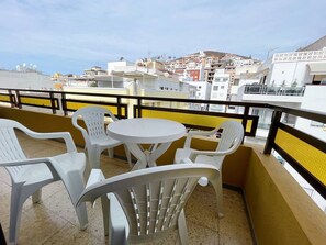 Outdoor dining - SIERRA - two bedroom with city views (Playa De Los Cristianos)