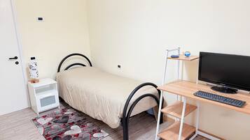 Desk, iron/ironing board, free WiFi, bed sheets