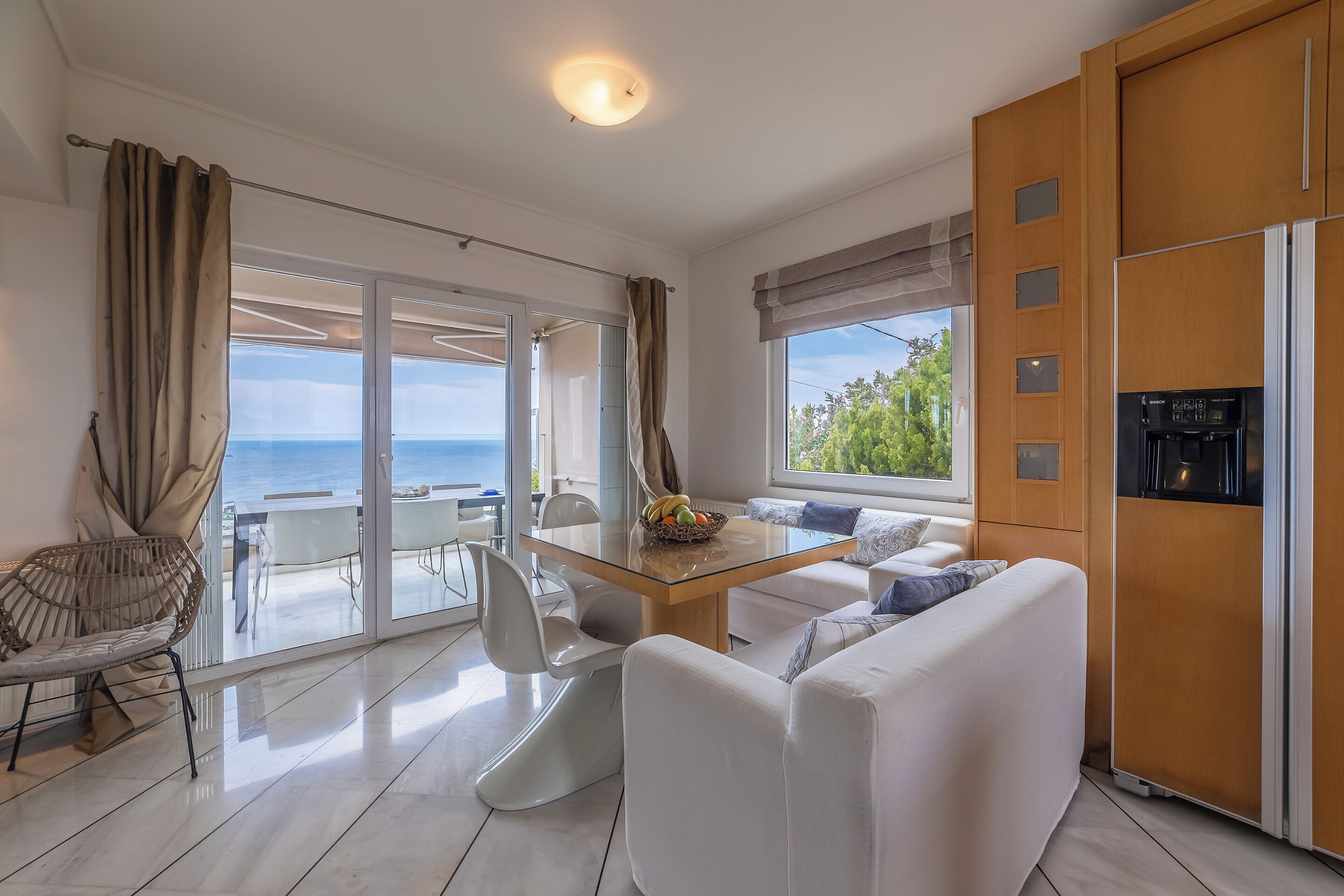 Superior villa, uitzicht op zee | Dineerruimte