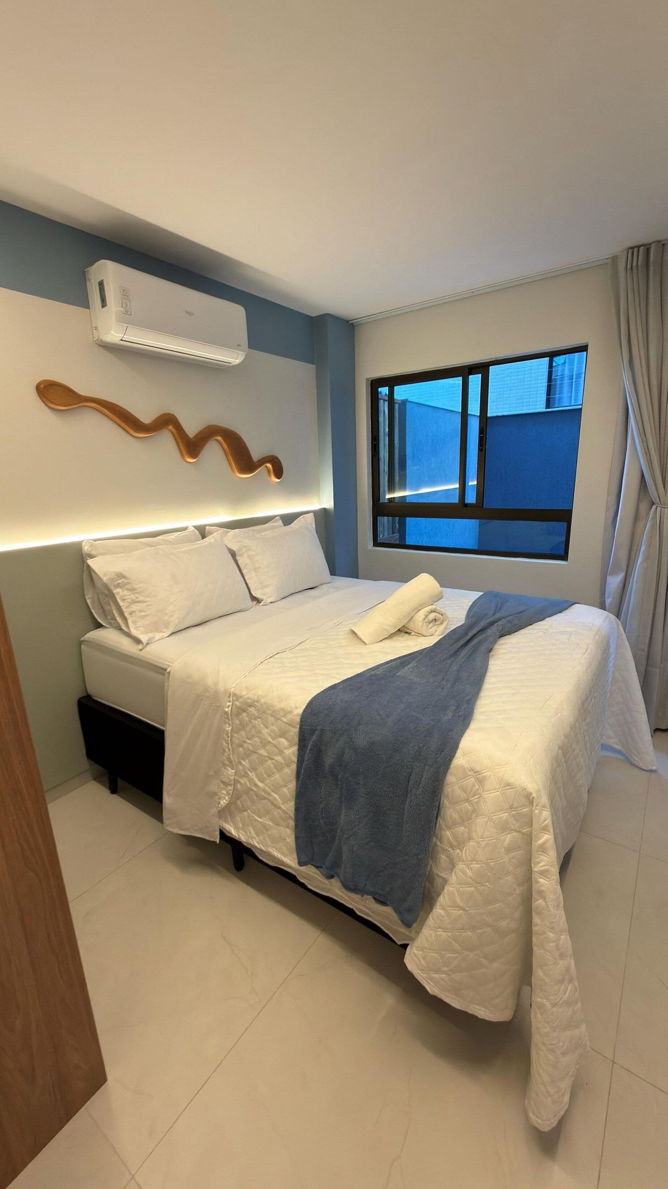 Căn hộ, 1 giường cỡ queen và sofa giường, ban công, quang cảnh hồ bơi | Khu vực làm việc phù hợp cho laptop 
