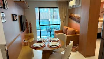 Apartment, 1 Queen Bed with Sofa bed, Balcony, Pool View | Dining