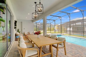 Outdoor dining - Solara Resort 10BR Luxury Villa + Private Pool (Kissimmee)