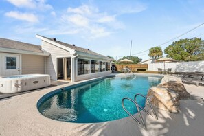 Outdoor pool, a heated pool - 90+ Day Furnished Retreat! Heated Pool, Spa, Game Room, and 4 King Beds! (Merritt Island)