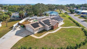 Exterior - 90+ Day Furnished Retreat! Heated Pool, Spa, Game Room, and 4 King Beds! (Merritt Island)
