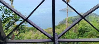 Rustic studio treehouse cabin in Paramin, perfect for quiet mountain-top getaway