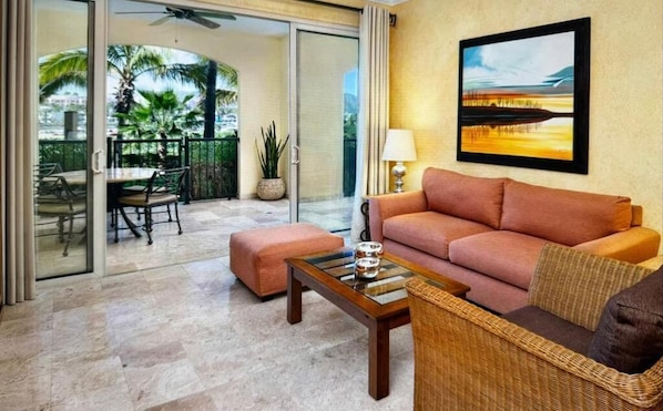 Elite Penthouse, Ocean View | Living area | 42-inch Smart TV with digital channels, DVD player, pay movies - Villa Del Arco (Cabo San Lucas)