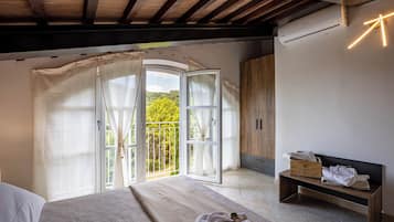 Suite, Pool View | Blackout drapes, iron/ironing board, free WiFi, bed sheets