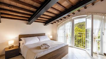 Suite, Pool View | Blackout curtains, iron/ironing board, free WiFi, bed sheets