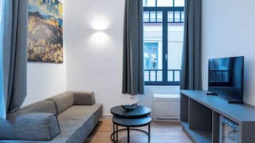 Chambre Triple Supérieure | Coin séjour