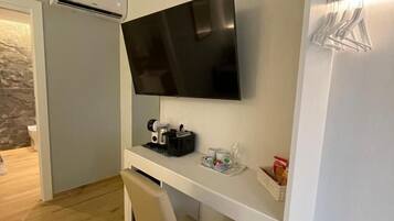 Chambre Confort Double ou avec lits jumeaux, vue jardin | Intérieur