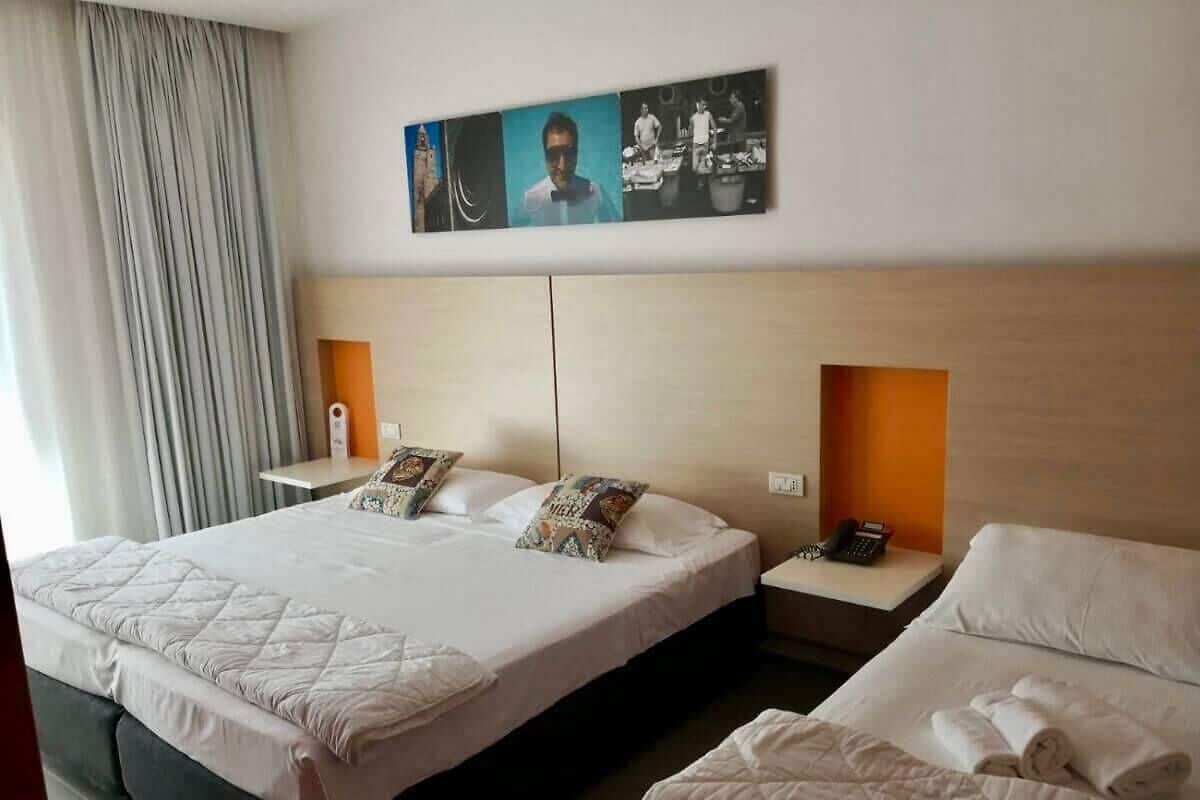 Triple Room, Pool View | In-room safe, desk, blackout drapes, free WiFi