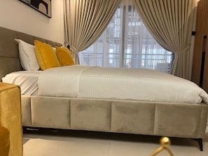 Studio Suite, Executive Level | Blackout drapes, soundproofing, iron/ironing board, free WiFi - CozyDeluxe Studio Apt in East Legon (Accra)