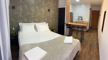 Suíte superior, vista para o pátio | Wi-Fi de cortesia