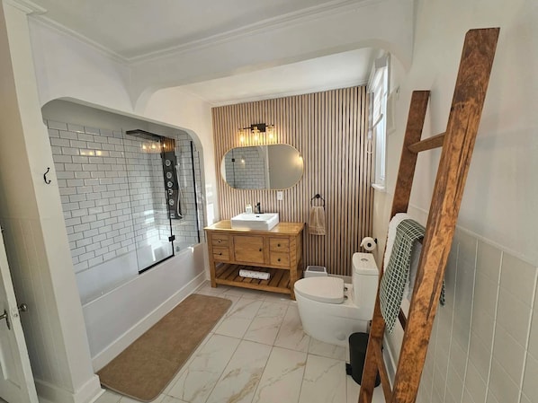 Hair dryer, towels, soap, toilet paper
