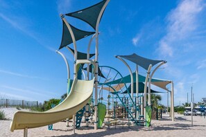 A playground with slides and climbing structures. - Ocean Lakes Site MH85, Handicap accessible, Sleeps 12, (Myrtle Beach)