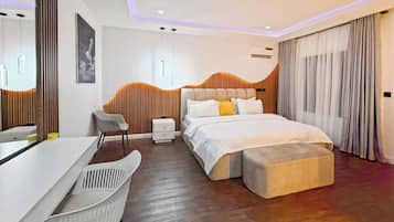 Comfort Apartment, Balcony, City View | In-room safe, desk, laptop workspace, blackout drapes