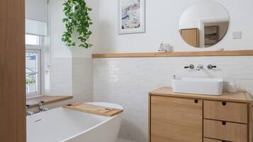 Shower, towels, soap, toilet paper