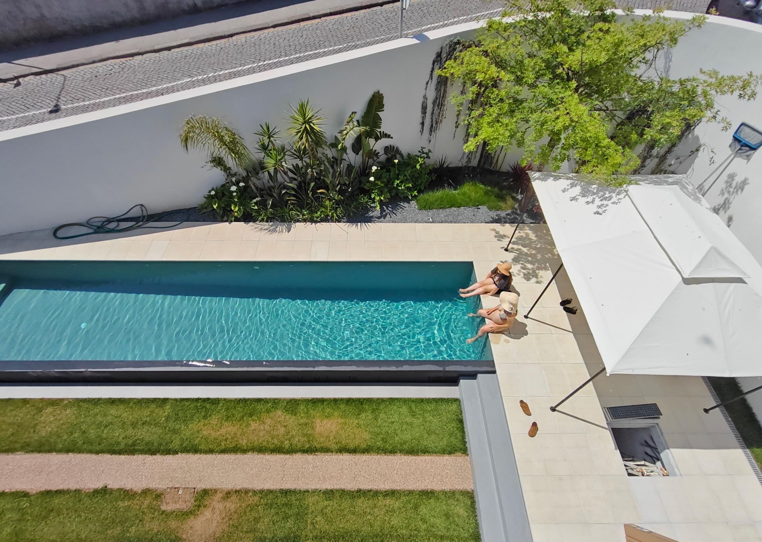 Seasonal outdoor pool, open 9:30 AM to 7:30 PM, pool umbrellas