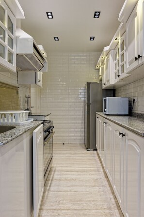 Fridge, cookware/dishes/utensils - VESTA - Luxury APT - 2BR - Heliopolis (Al Golf)
