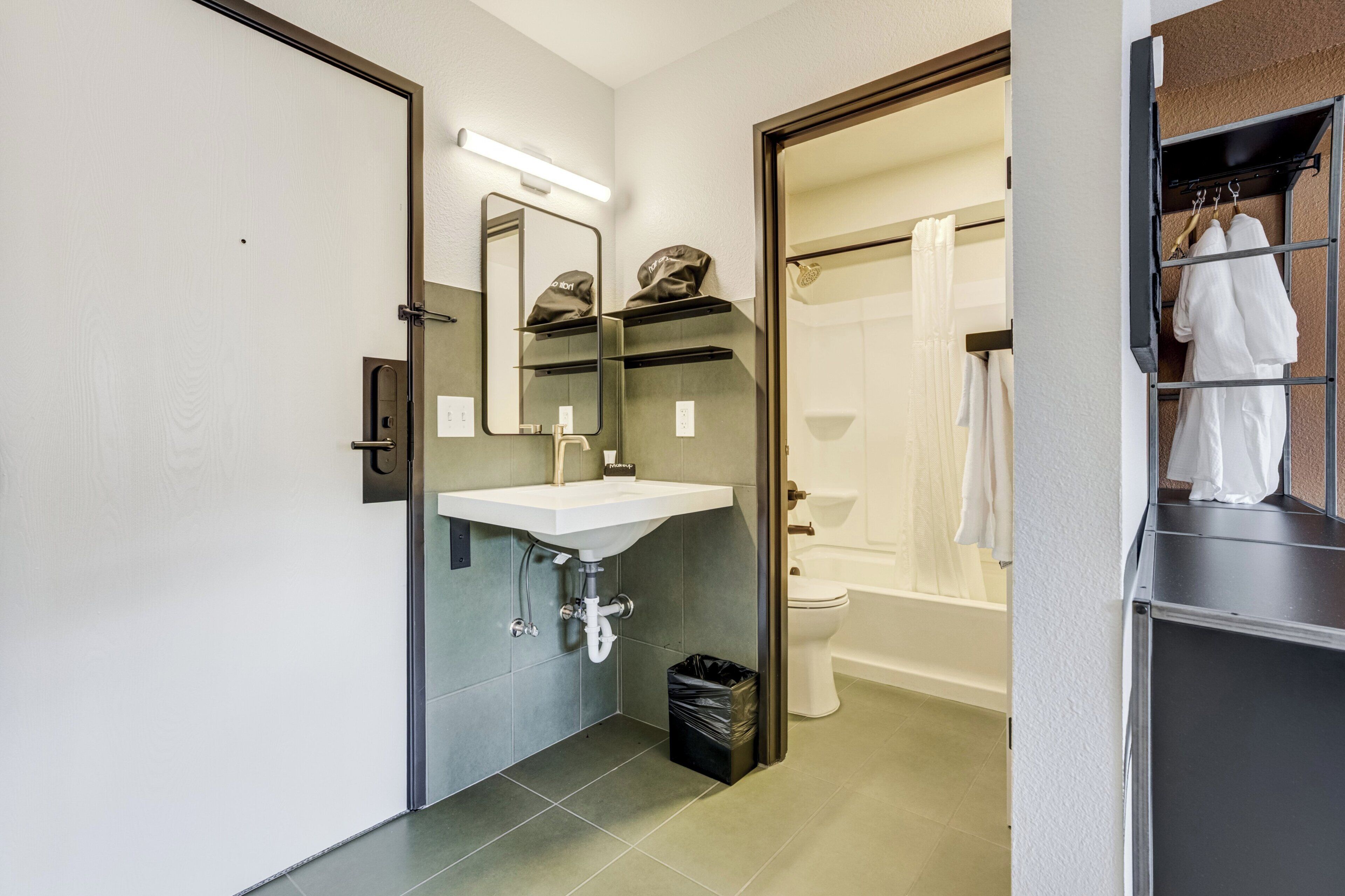 Combined shower/bathtub, hair dryer, towels, soap