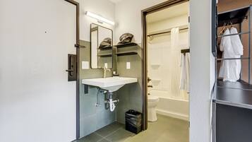Combined shower/bathtub, hair dryer, towels, soap
