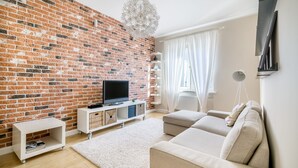 Leilighet – comfort, byutsikt | Oppholdsområde