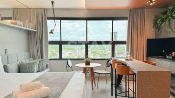 Studio Design, vue ville | Coin séjour