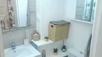 Hair dryer, towels, soap, toilet paper