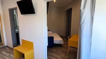 Family Room, City View | In-room safe, blackout drapes, free WiFi, wheelchair access