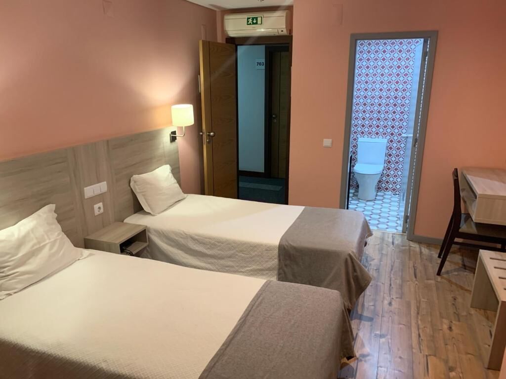 Twin Room, City View | In-room safe, blackout drapes, free WiFi, wheelchair access