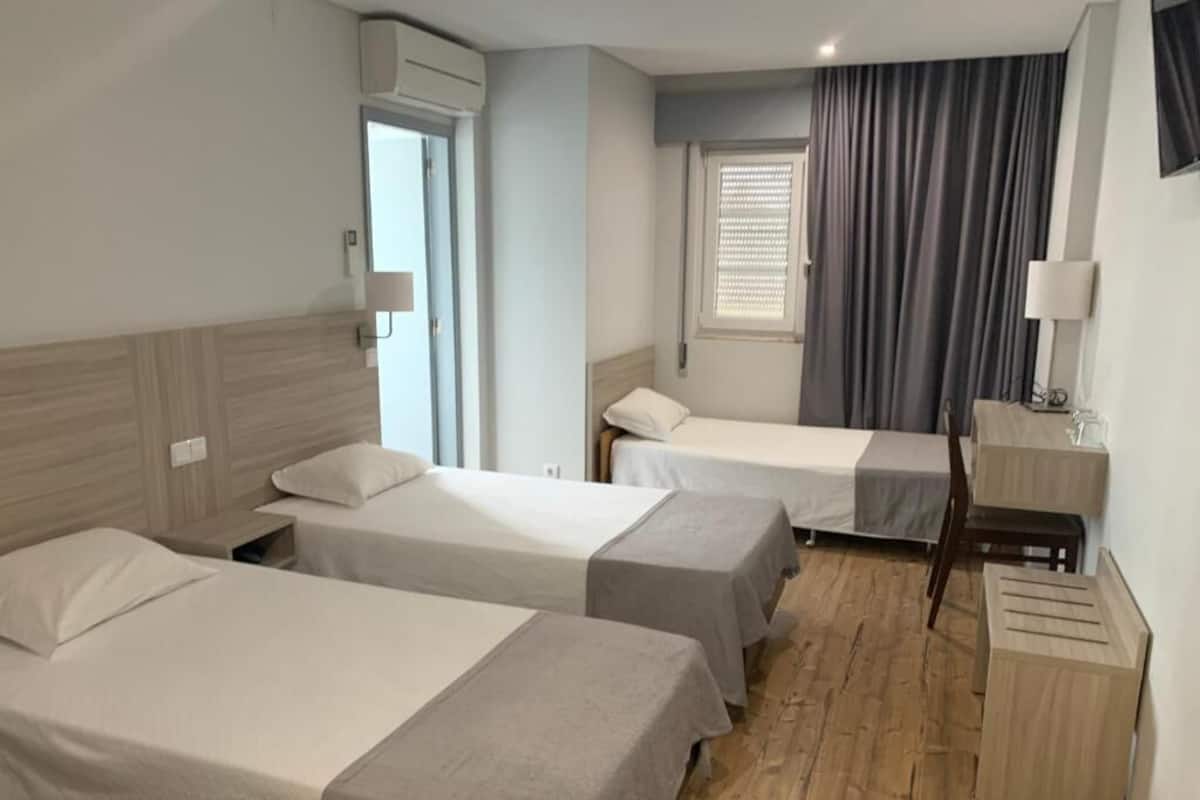 Triple Room, City View | In-room safe, blackout drapes, free WiFi, wheelchair access