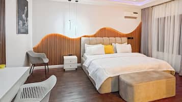 Family Apartment, Balcony, City View | In-room safe, desk, laptop workspace, blackout drapes