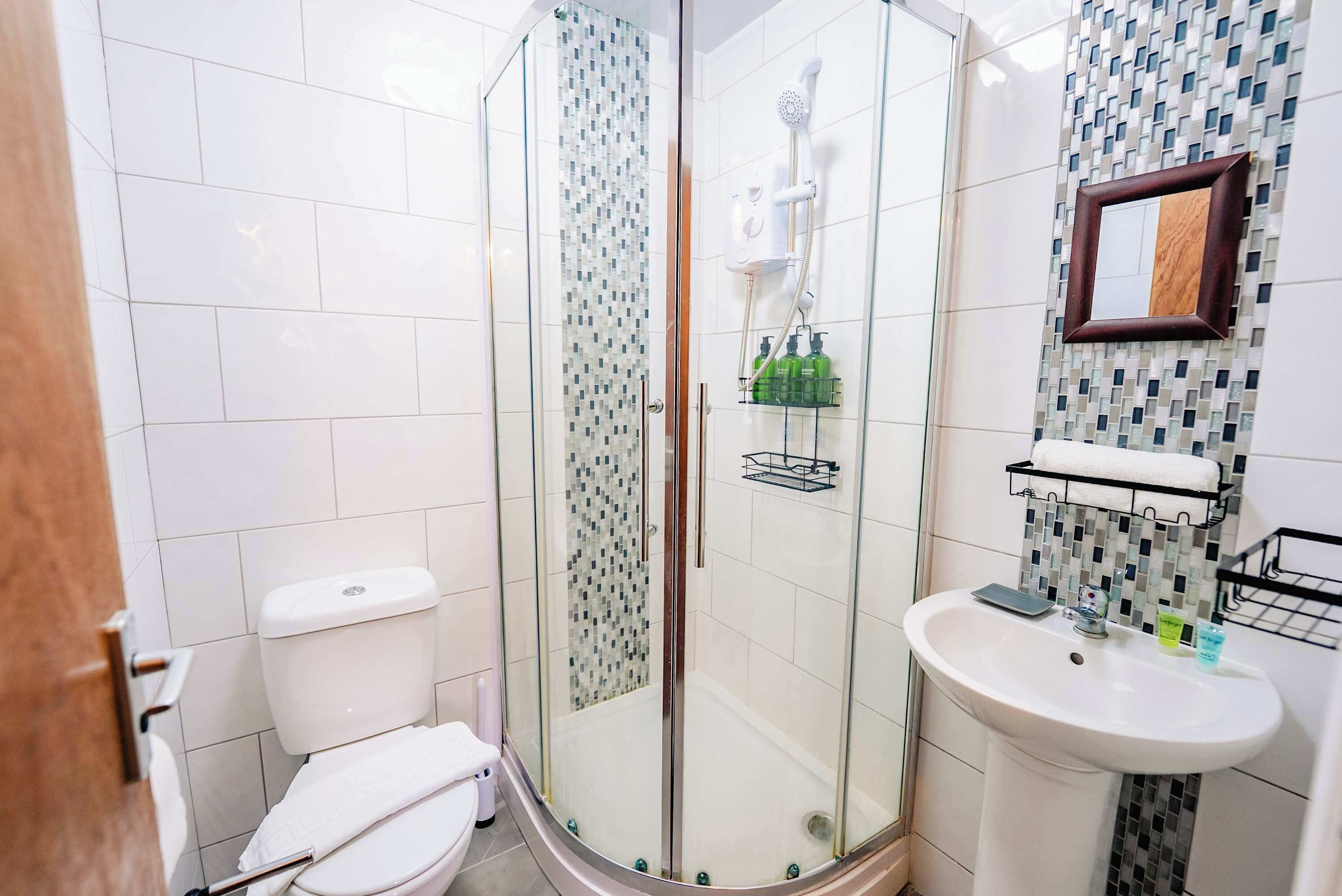 Shower, hair dryer, towels