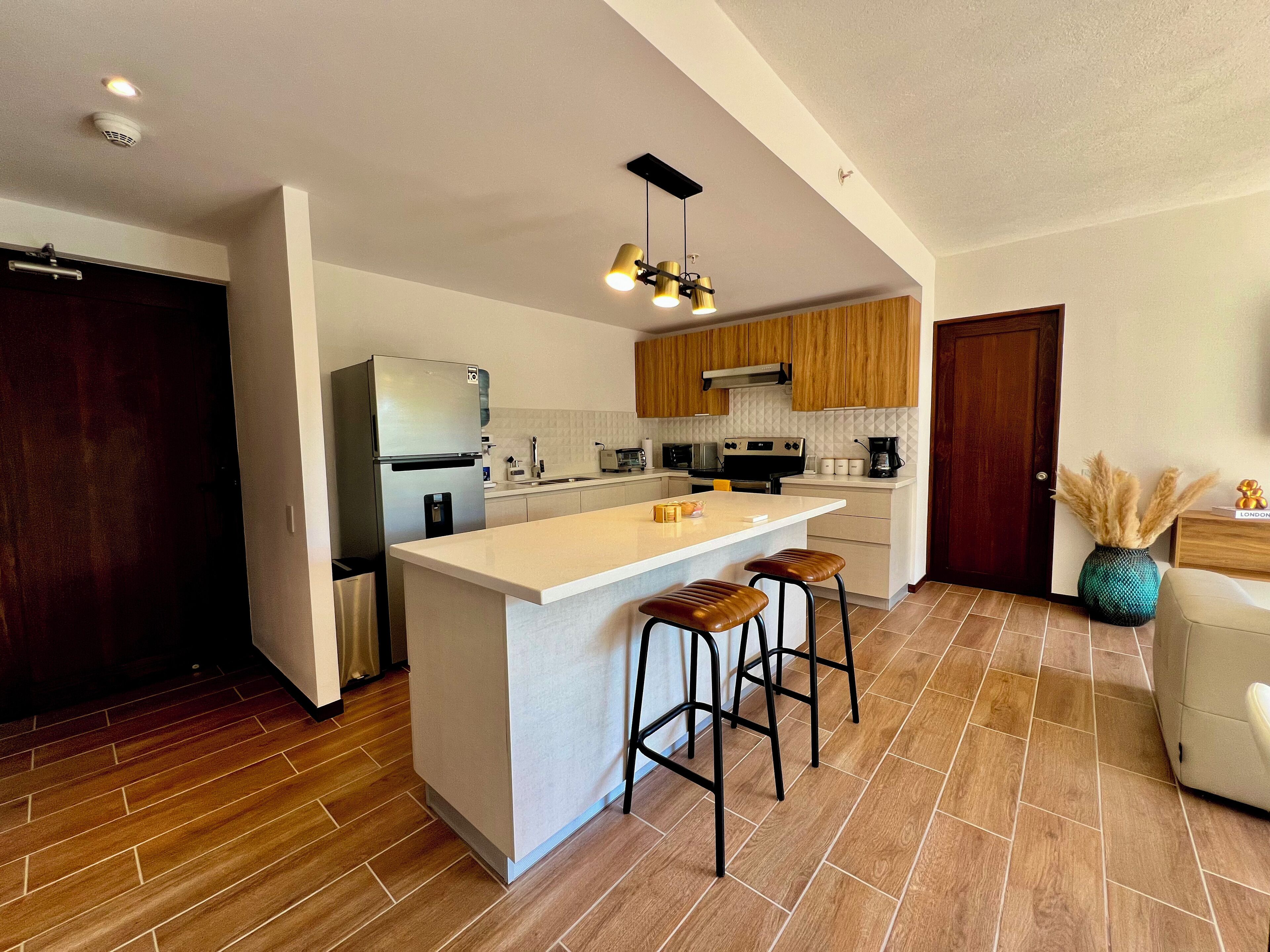Coffee/tea maker, fridge, microwave, oven