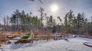 A snowy forest with a wooden fence and a clear sky. - 6 Mi to Tanglewood! High-End Lee Apartment (Lee)