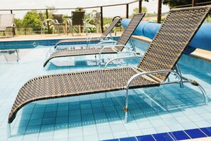 Outdoor pool, open 8:00 AM to 8:00 PM, pool umbrellas, sun loungers