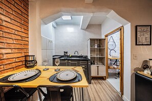 Estúdio clássico, vista para a cidade | Cozinha privada