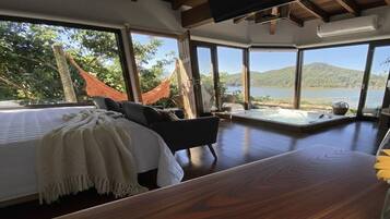 Deluxe Suite, Lanai, Beach View | Laptop workspace, free WiFi