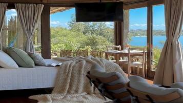 Suite Deluxe, lanai, vista a la playa | Espacio para trabajar con laptop y wifi gratis