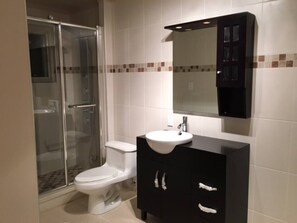 Shower, hair dryer, towels, soap