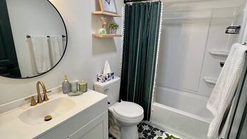 Hair dryer, towels, soap, toilet paper