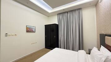 Deluxe Apartment, City View | Blackout curtains, iron/ironing board, free WiFi