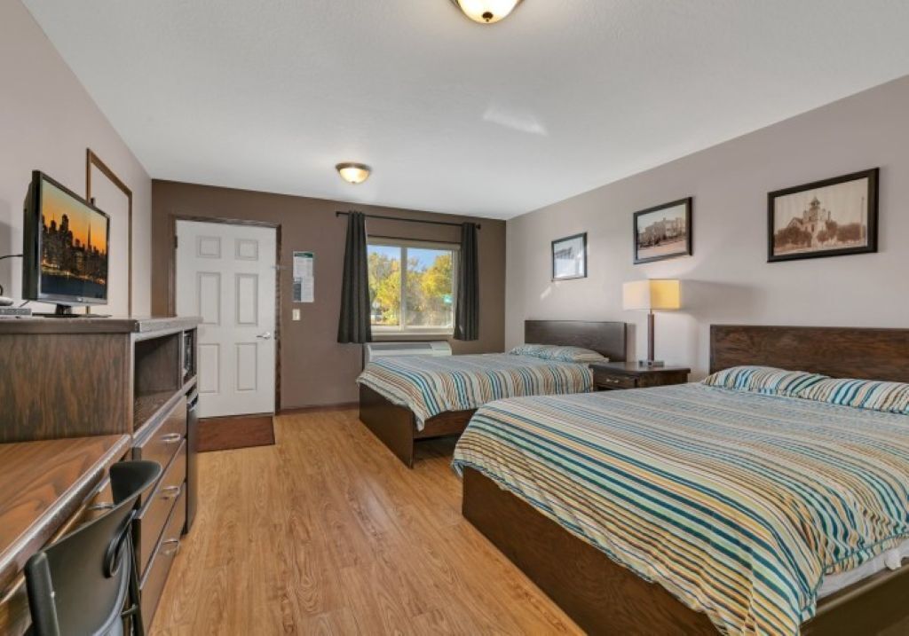 Classic Double Room, 2 Queen Beds, Non Smoking | Desk, laptop workspace, blackout drapes, iron/ironing board