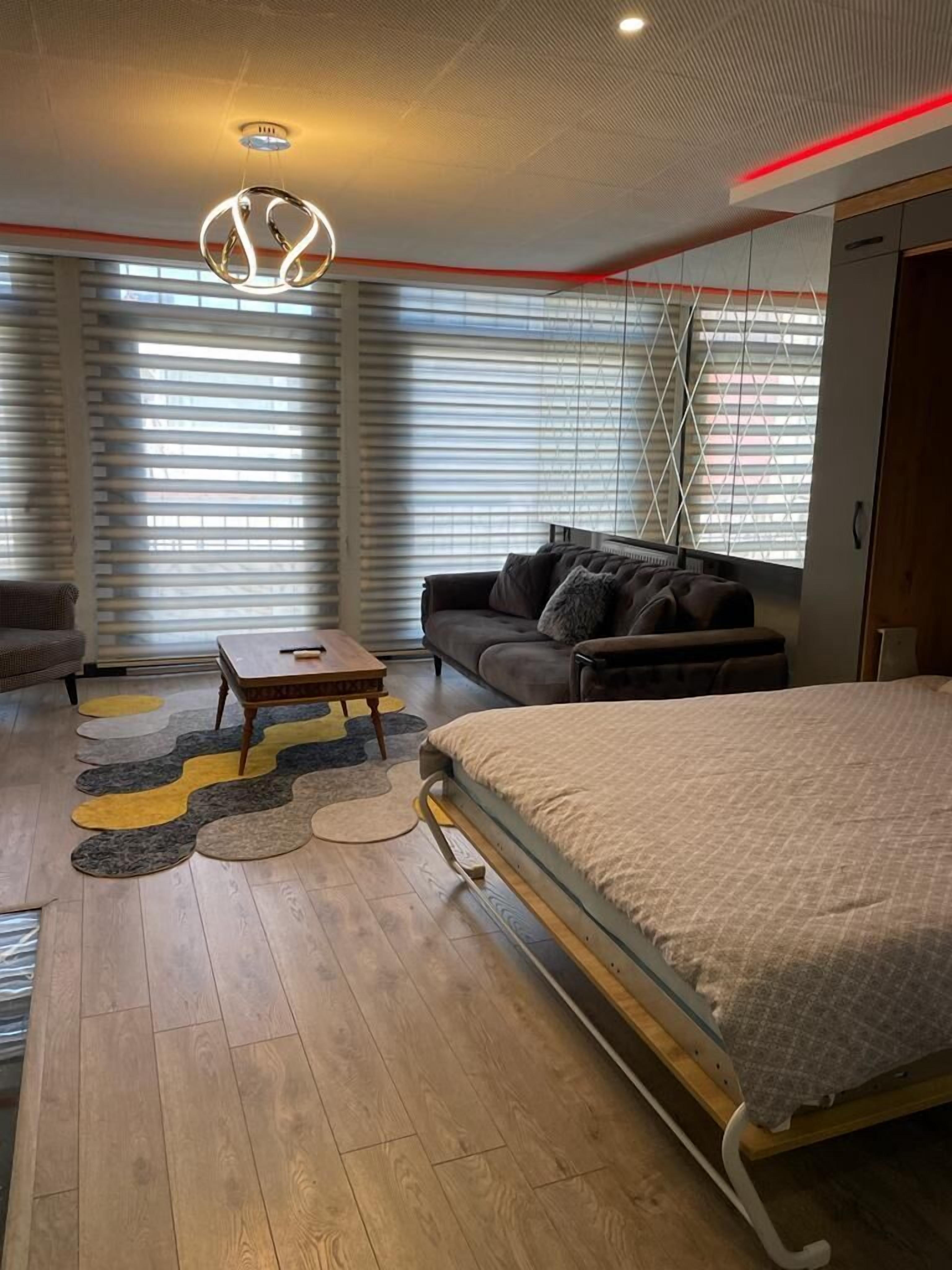 Studio – premium, byutsikt | Oppholdsområde